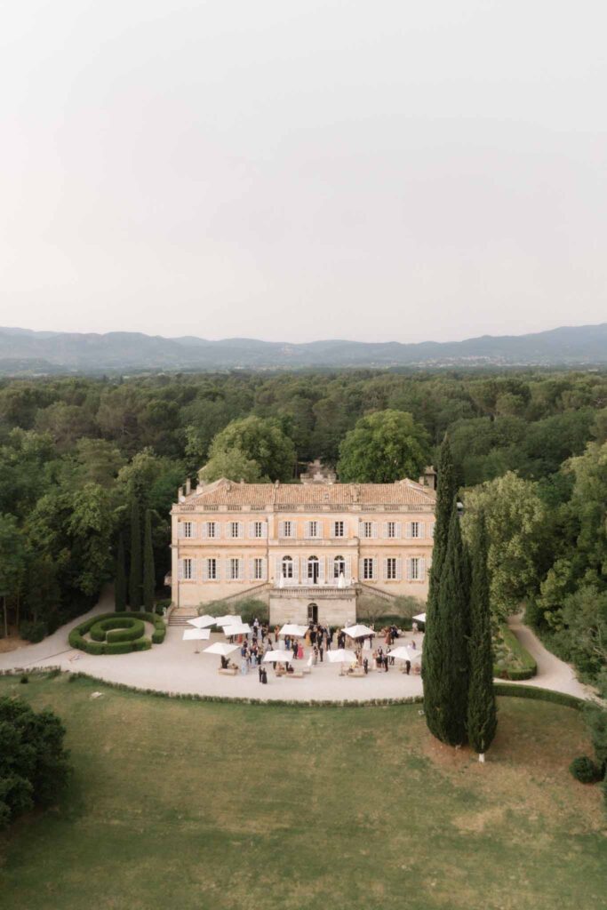 Chateau de Martinay Despinoy Wedding aerial shot wide shot white umbrella landscape outside venue