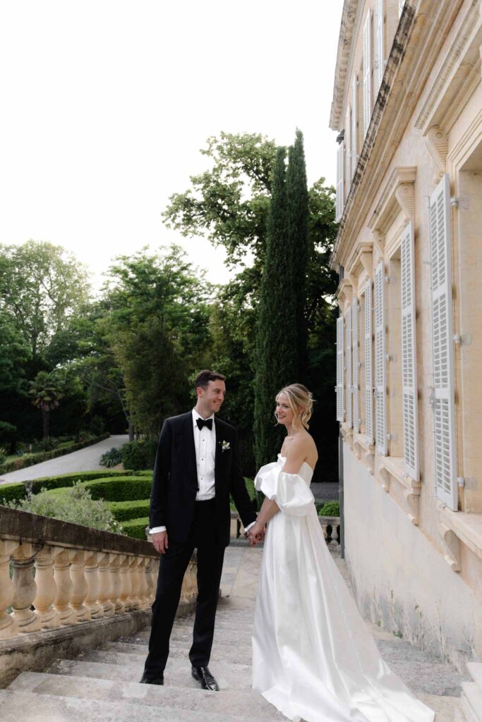 Chateau de Martinay Despinoy Wedding bride groom holding opposite hands looking each otherjpg