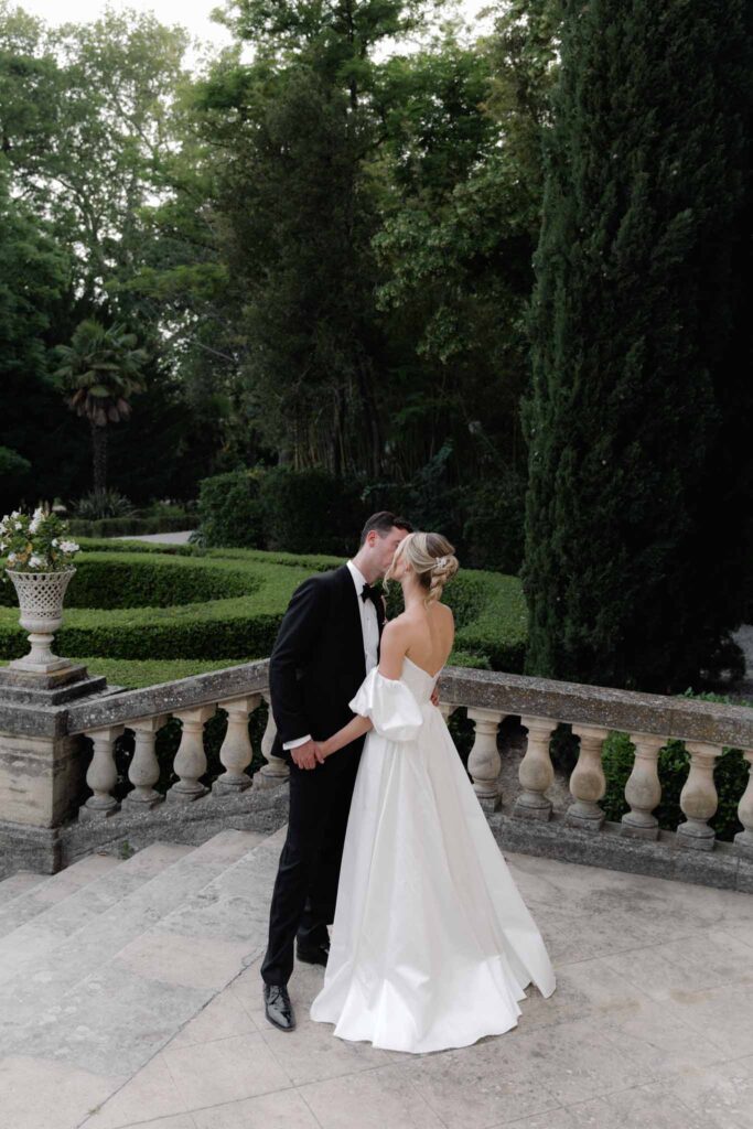 Chateau de Martinay Despinoy Wedding bride groom kissing landscape background