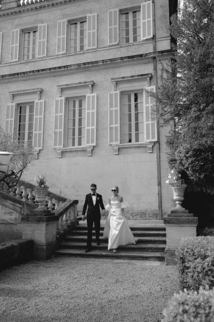 Chateau de Martinay Despinoy Wedding bride groom wearing shades reception entrance black white photo