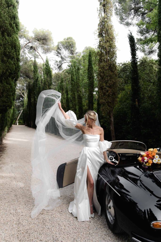 Chateau de Martinay Despinoy Wedding bride posing black vintage car