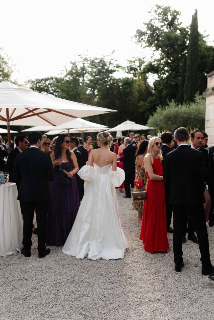 Chateau de Martinay Despinoy Wedding bride walking through guests cocktail areajpg