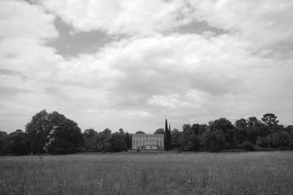 Chateau de Martinay Despinoy Wedding field outside venue black white photo