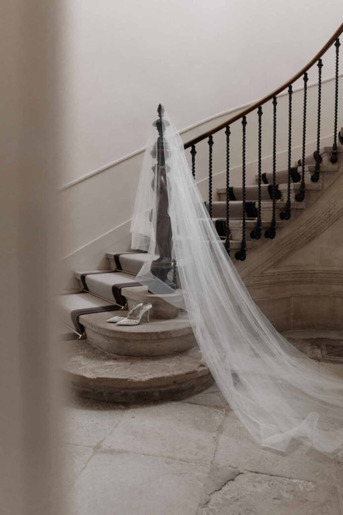 Chateau de Martinay Despinoy Wedding veil pointed shoes by the vintage stairs