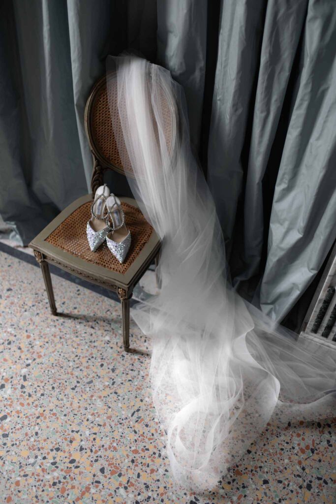 Chateau de Martinay Despinoy Wedding veil pointed sparkle shoes wood chair