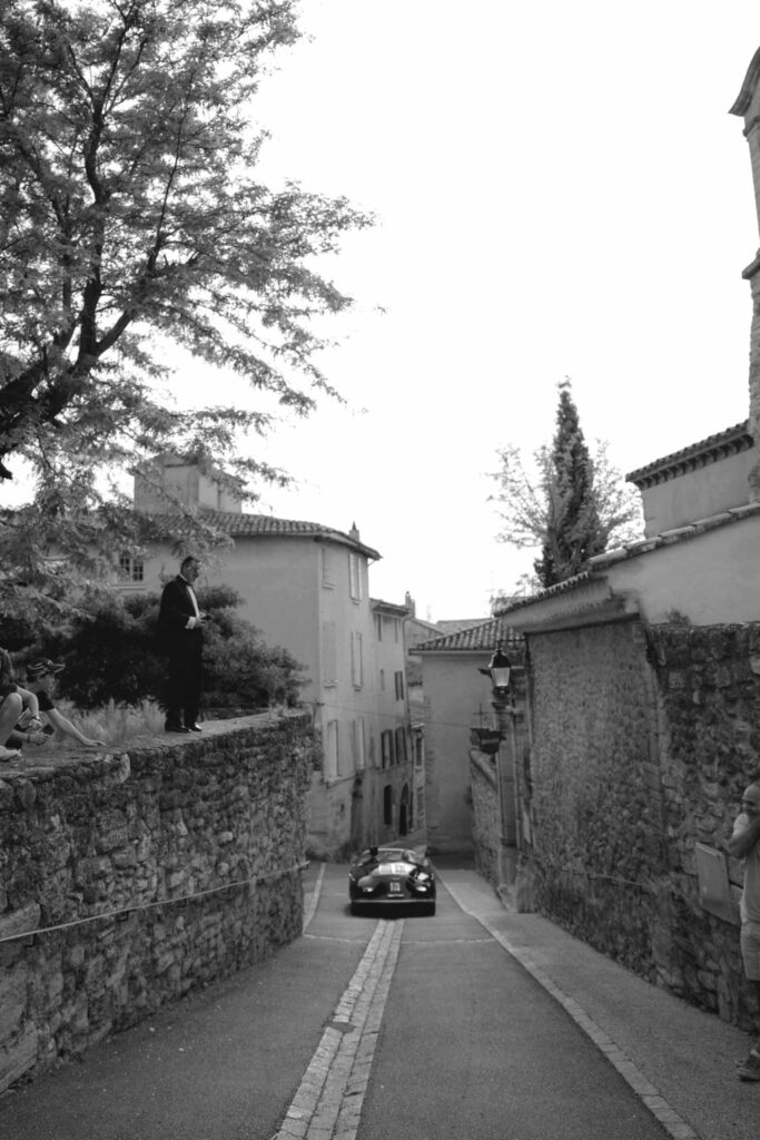 Chateau de Martinay Despinoy Wedding vintage car leaving wedding black white photo