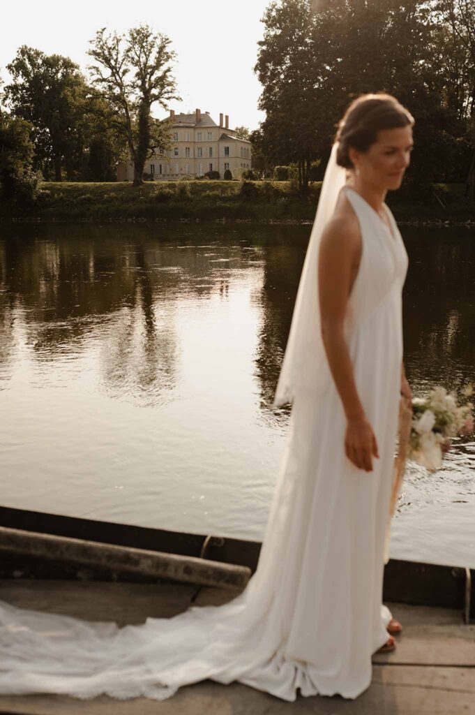 Loire Valley Il Keys bride by the river sunset simple dress