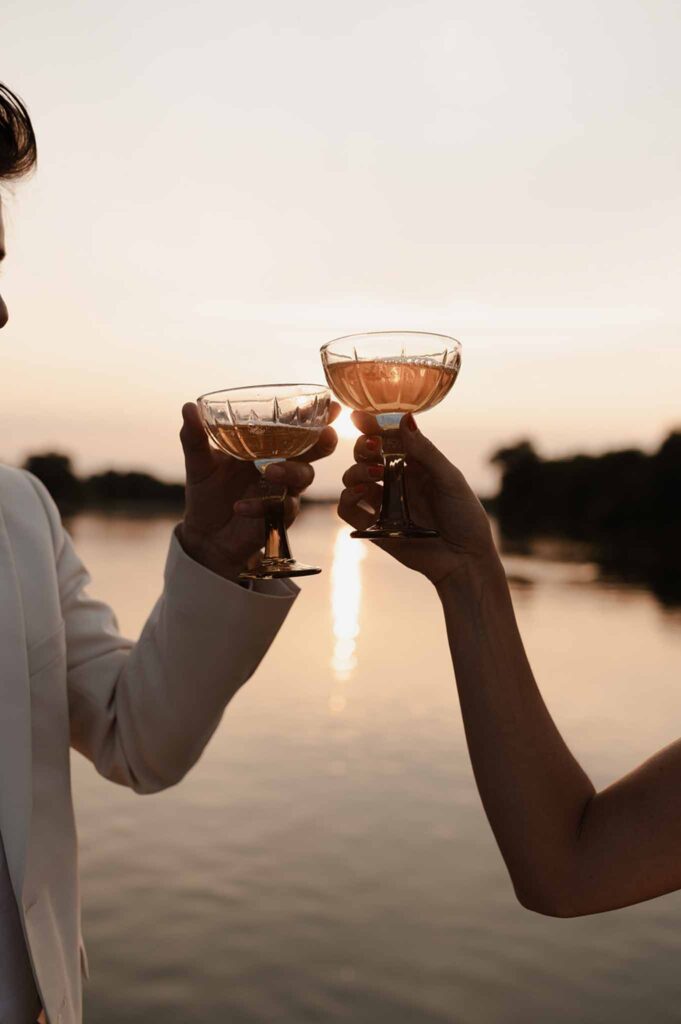 Loire Valley Il Keys bride groom wine glass toss river sunset