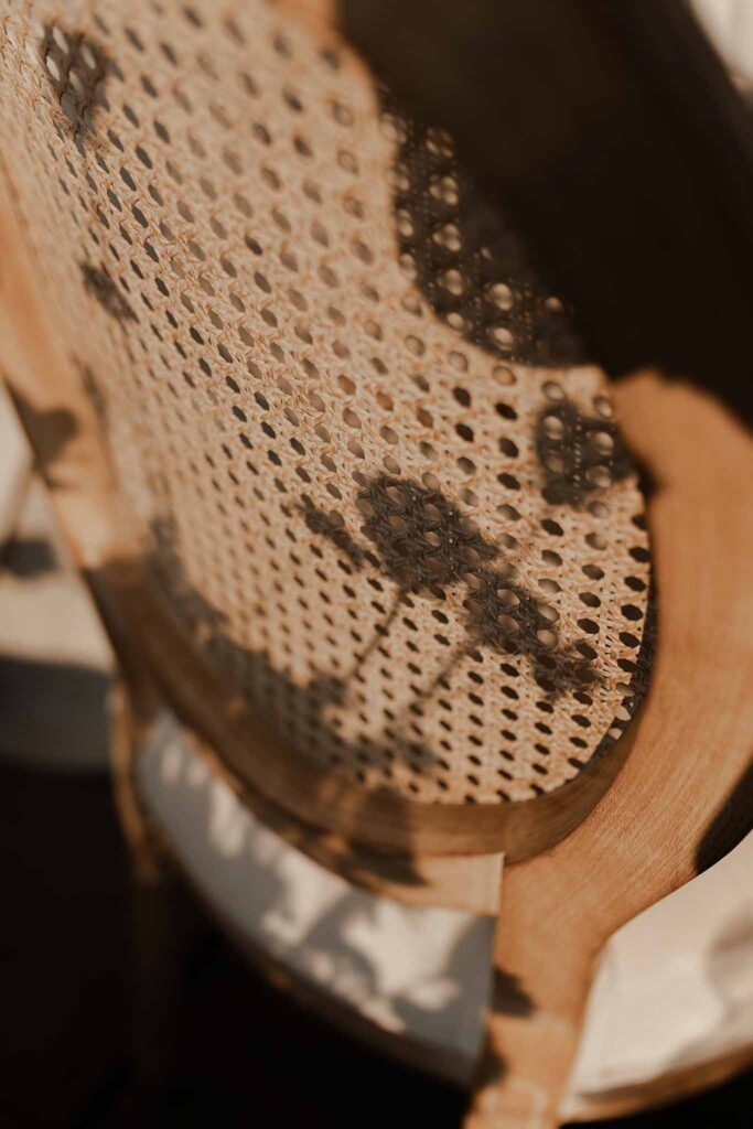 Loire Valley Il Keys detail shot wood rattan chair sunlight