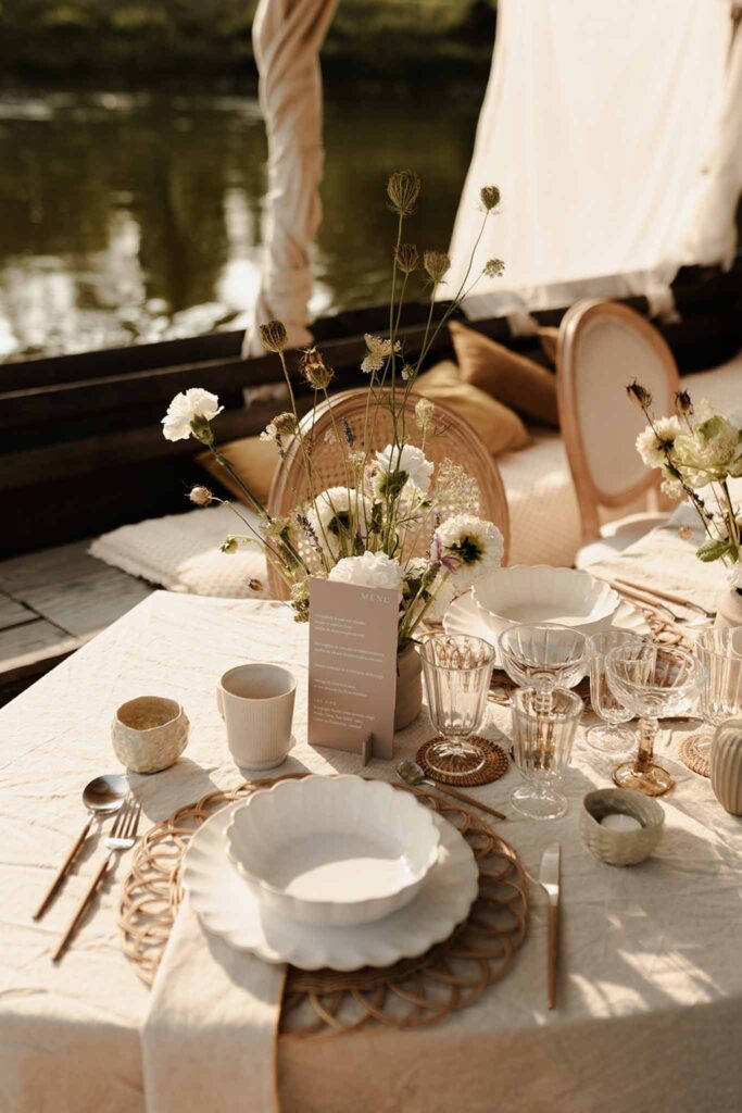 Loire Valley Il Keys rustic set up reception area white plates flowers