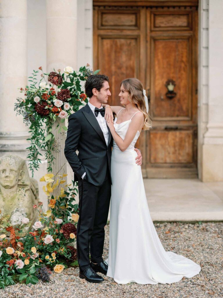 Marcellus Q.H.Quinze bride groom looking at each other