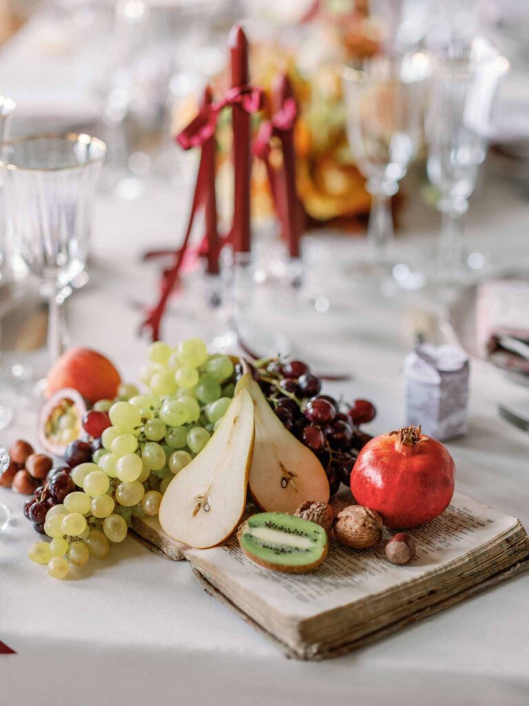 Marcellus Q.H.Quinze different fruits in vintage book reception table