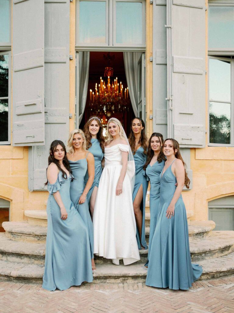 g.dominic m.marechal bride bridesmaid dusty blue dresses outside chateau