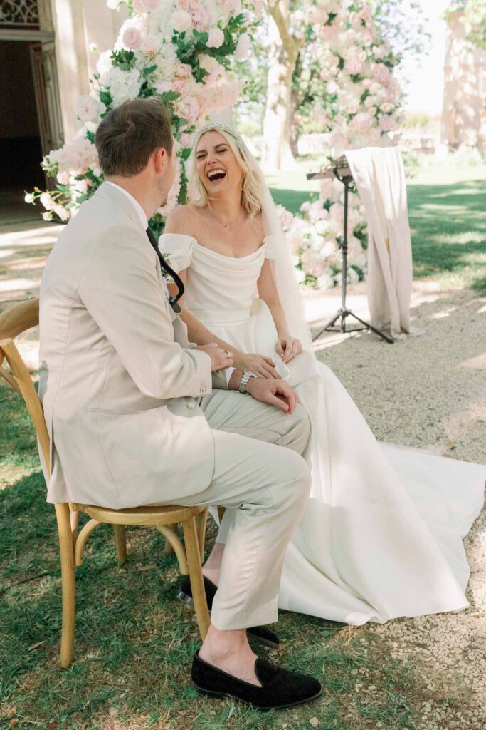 g.dominic m.marechal bride laughing looking at groom ceremony proper