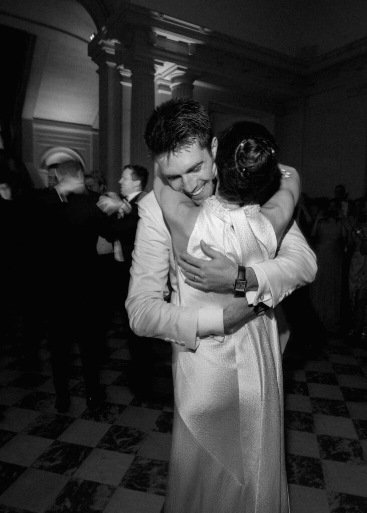 saint martin H.Clark bride groom hugging after party