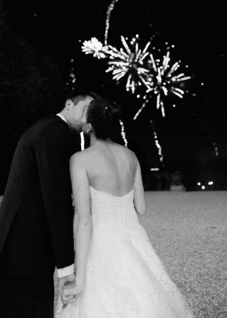 saint martin H.Clark bride groom kissing fireworks black white photo