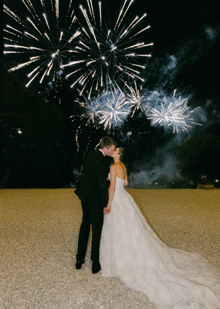 saint martin H.Clark bride groom kissing under fireworks