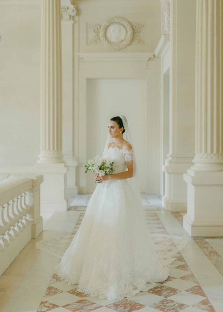 saint martin H.Clark bride hallway holding bouquet