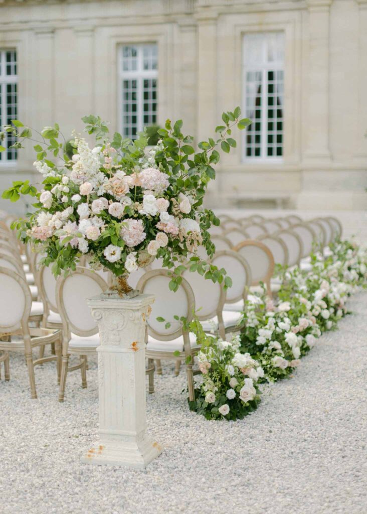 saint martin H.Clark white round chairs blush white flowers ceremony