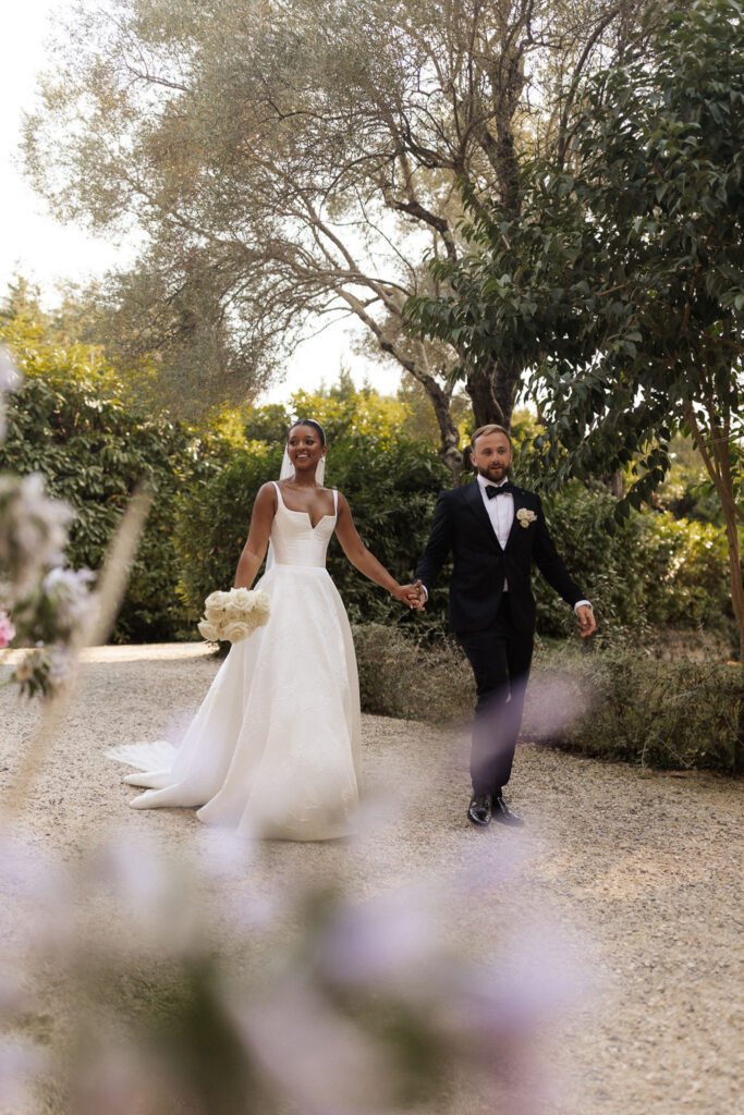 Bastide du Roy J.Jellet bride groom holding hands while walking