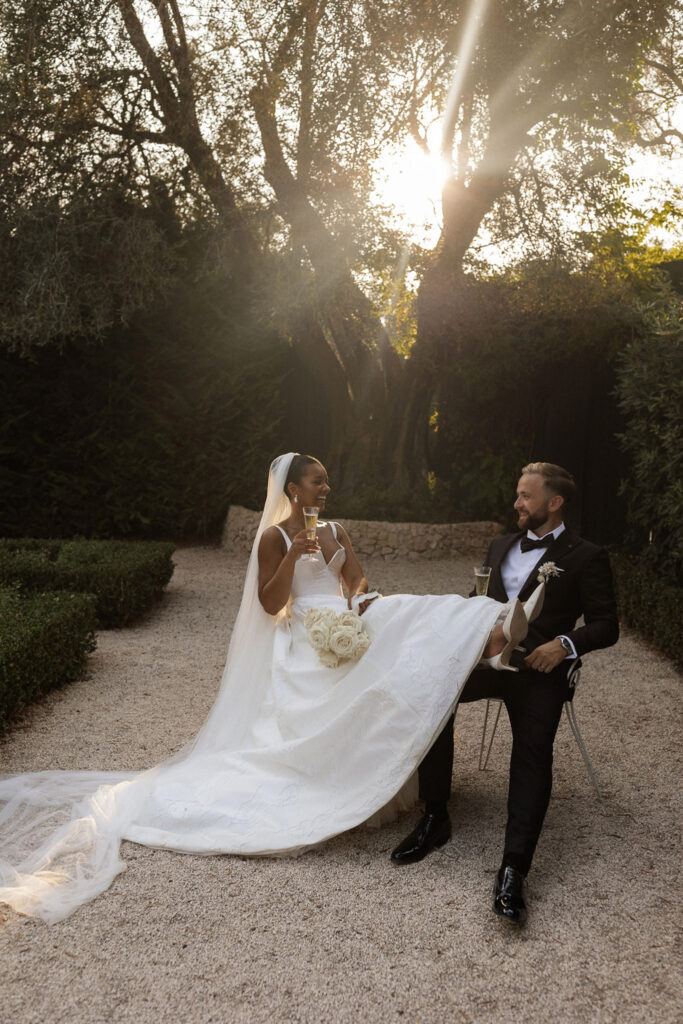 Bastide du Roy J.Jellet bride groom sitting holding champagne glass