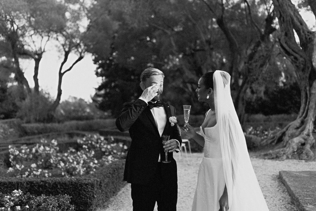 Bastide du Roy J.Jellet groom wiping eyes bride looking black white photo