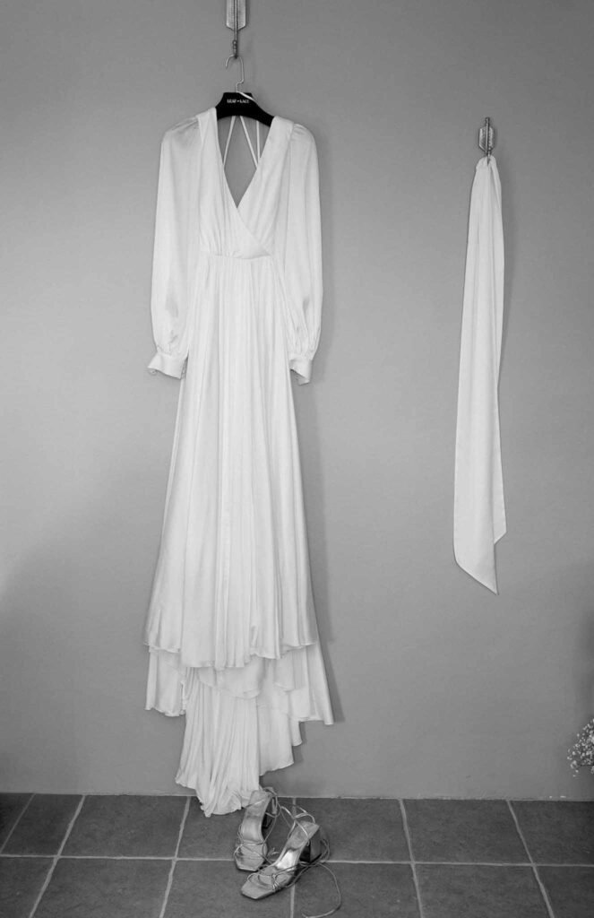 Clos d Hullias Ozaria bride dress veil hanging wall shoes black white photo