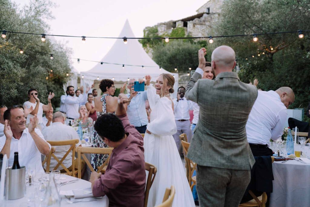 Clos d Hullias Ozaria groom bride entrance reception clapping white tent