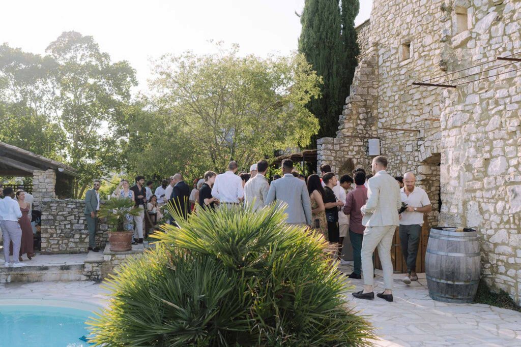 Clos d Hullias Ozaria guests cocktail area standing pool brick wall building