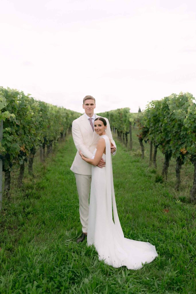 bride and groom in chateau soulac vineyards