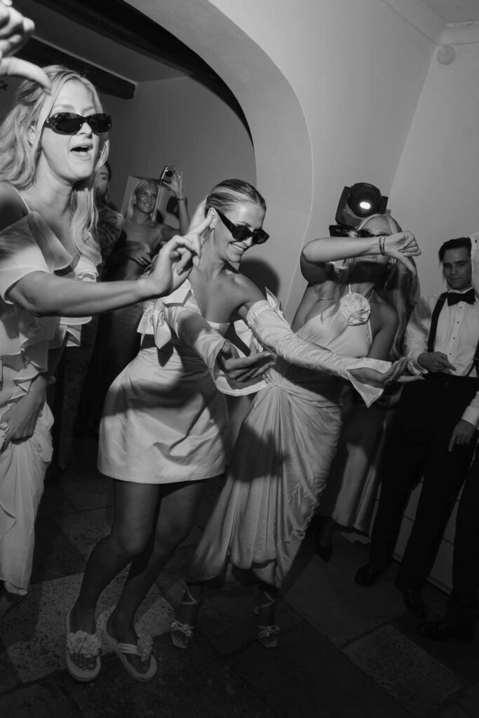 lesCrostes Ingrid bride bridesmaid dancing wearing shades black white photo