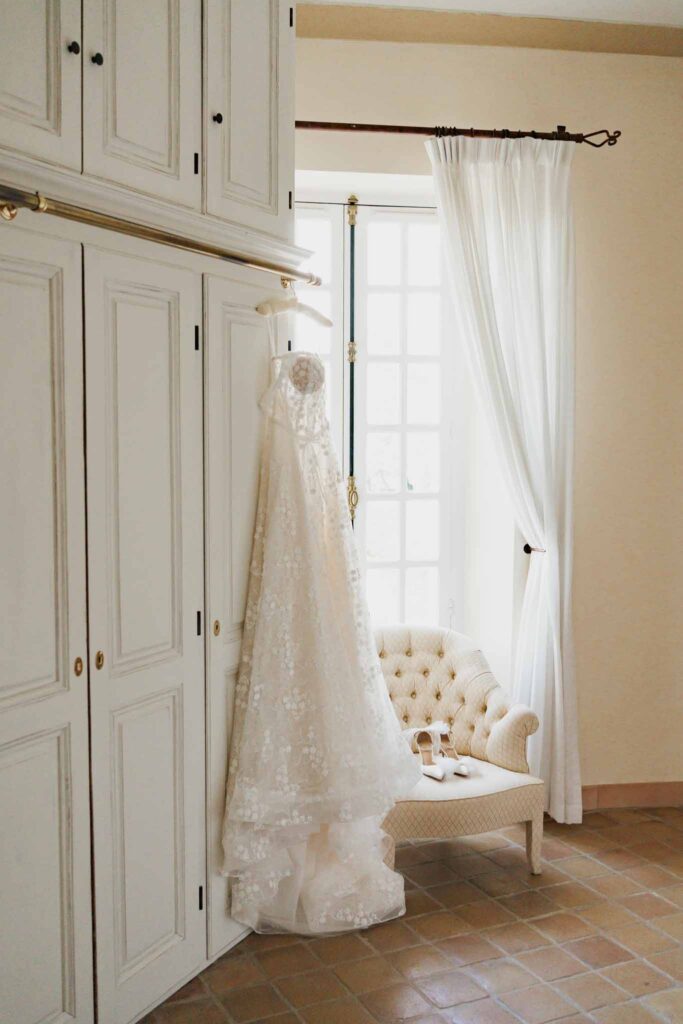 lesCrostes Ingrid bride dress hanging white cabinet