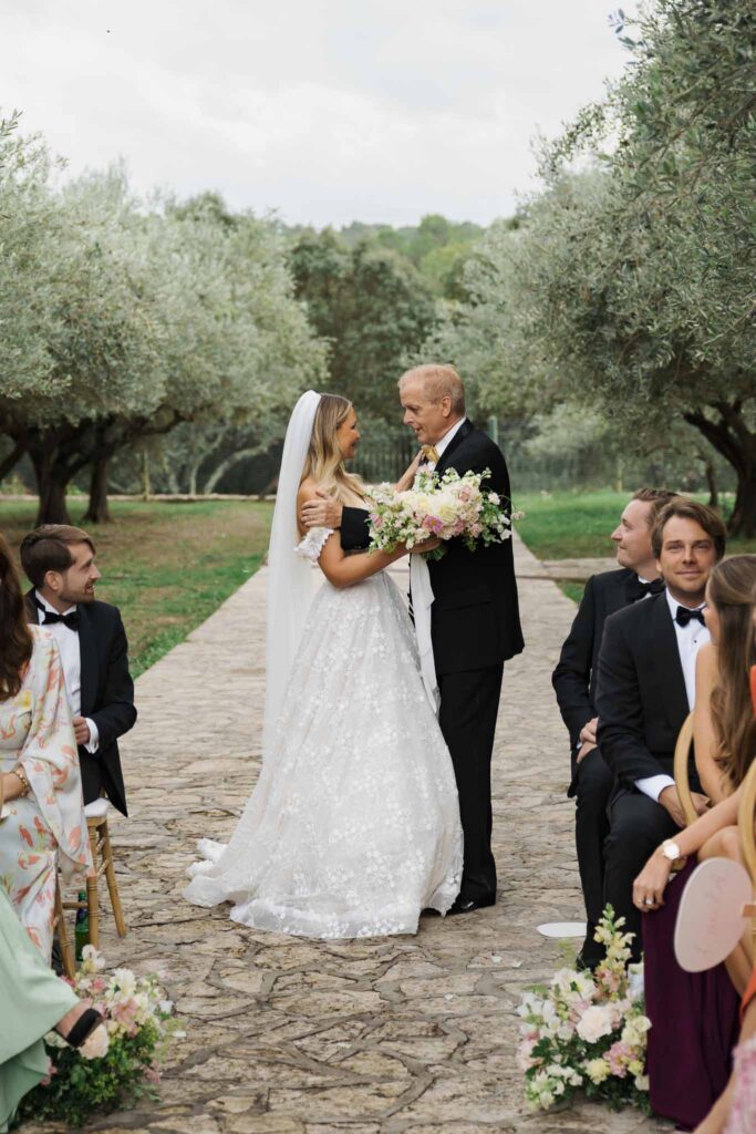 lesCrostes Ingrid bride father looking each other walking aisle ceremony