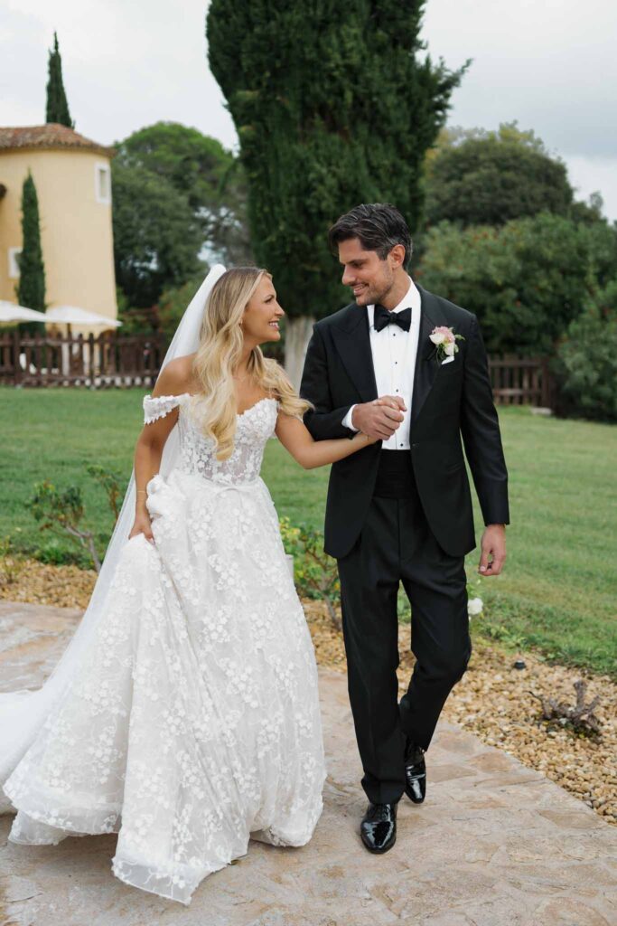 lesCrostes Ingrid bride groom holding hands by chest looking each other