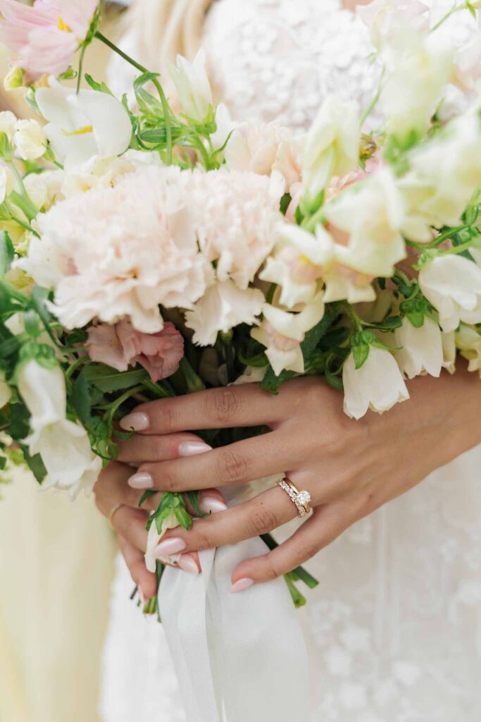 lesCrostes Ingrid detail shot bride holding bouquet engagement ring