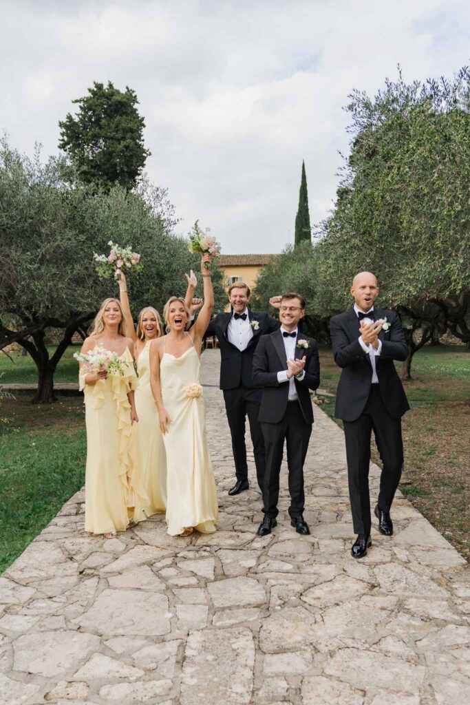 lesCrostes Ingrid entourage walking clapping hands in air after ceremony