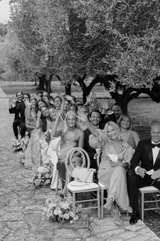 lesCrostes Ingrid guests seated ceremony black white photo