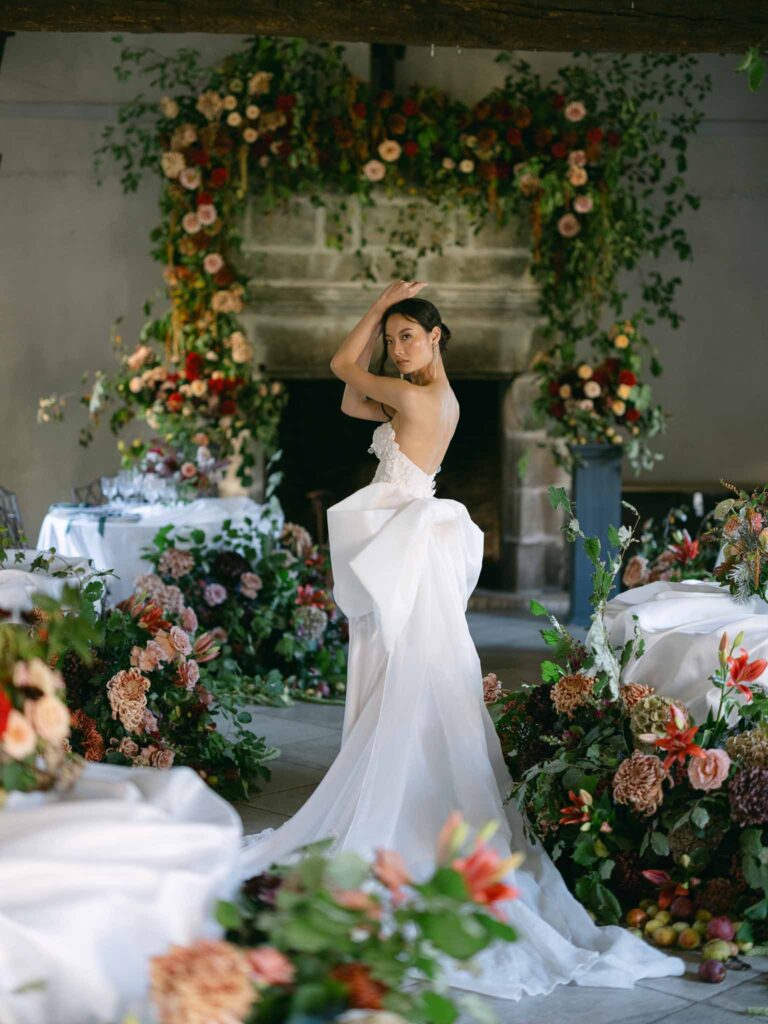 wedding editorial at Manoir de Vacheresses Capucine Atelier Dogwood Fir bride reception area standing center flowers around