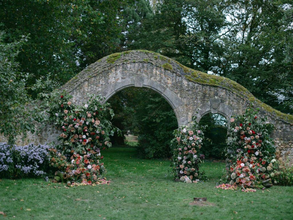 Manoir de Vacheresse Capucine detail shot brick structure garden flower decor