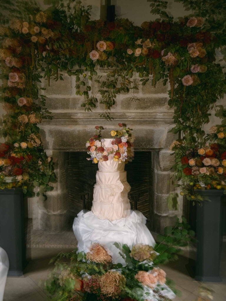 Manoir de Vacheresse Capucine detail shot film blurry reception four tier cake table 