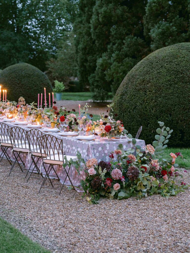 wedding editorial at Manoir de Vacheresses Capucine Atelier detail shot reception table garden landscape plants flower centerpiece