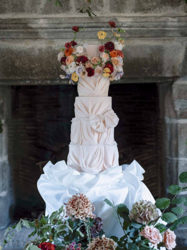 Manoir de Vacheresse Capucine four tier fondant cake flower decor close up