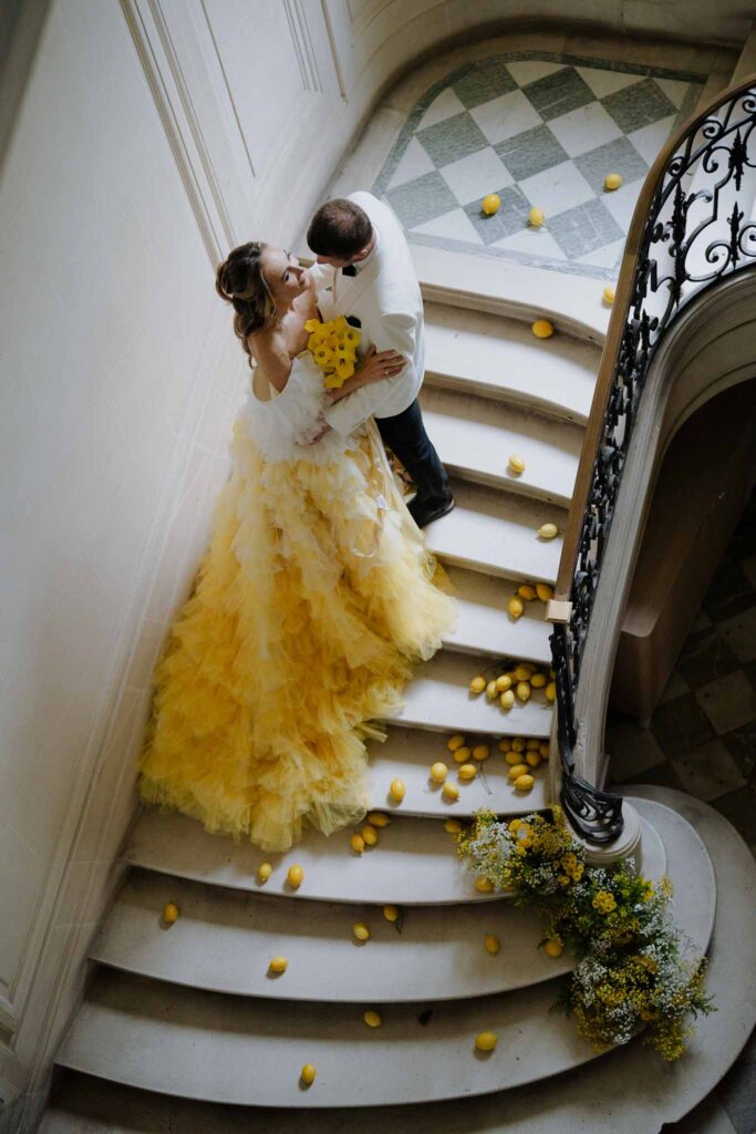 Prunay Theatre of Real Life n.reznik bride groom kissing vintage stairs top shot lemons decor