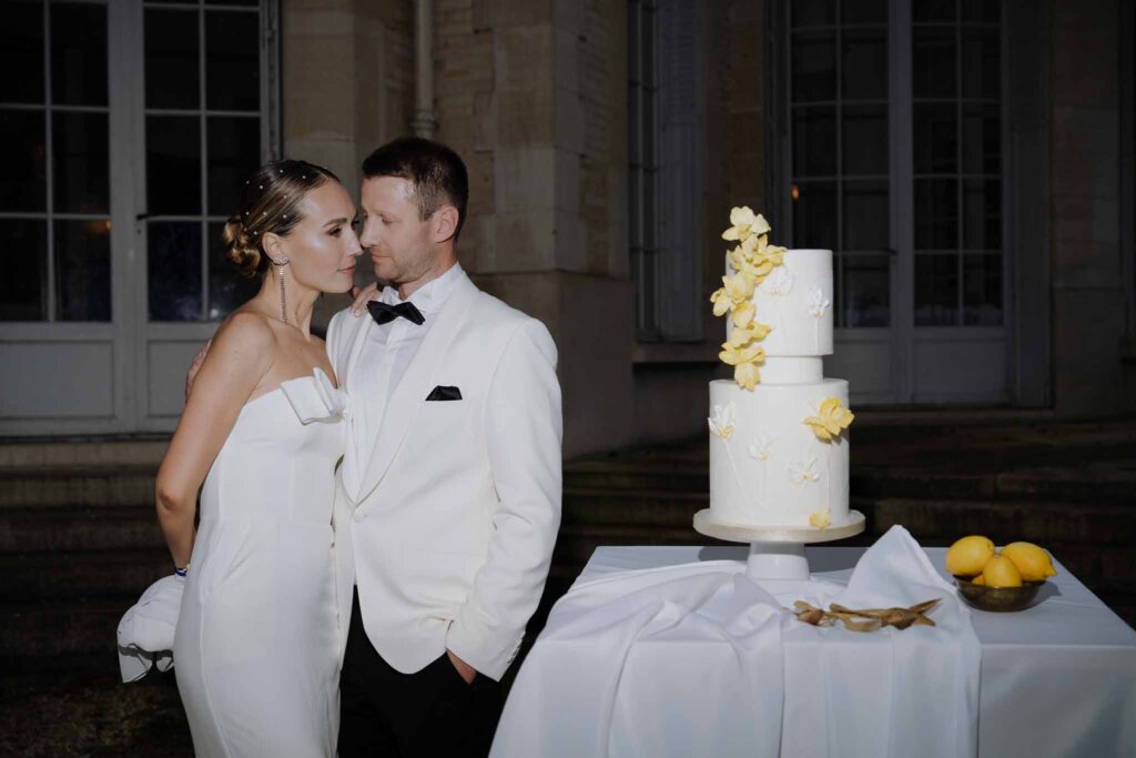 Prunay Theatre of Real Life n.reznik bride groom standing beside cake night reception