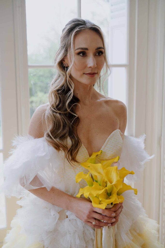 Prunay Theatre of Real Life n.reznik bride holding yellow flower bouquet