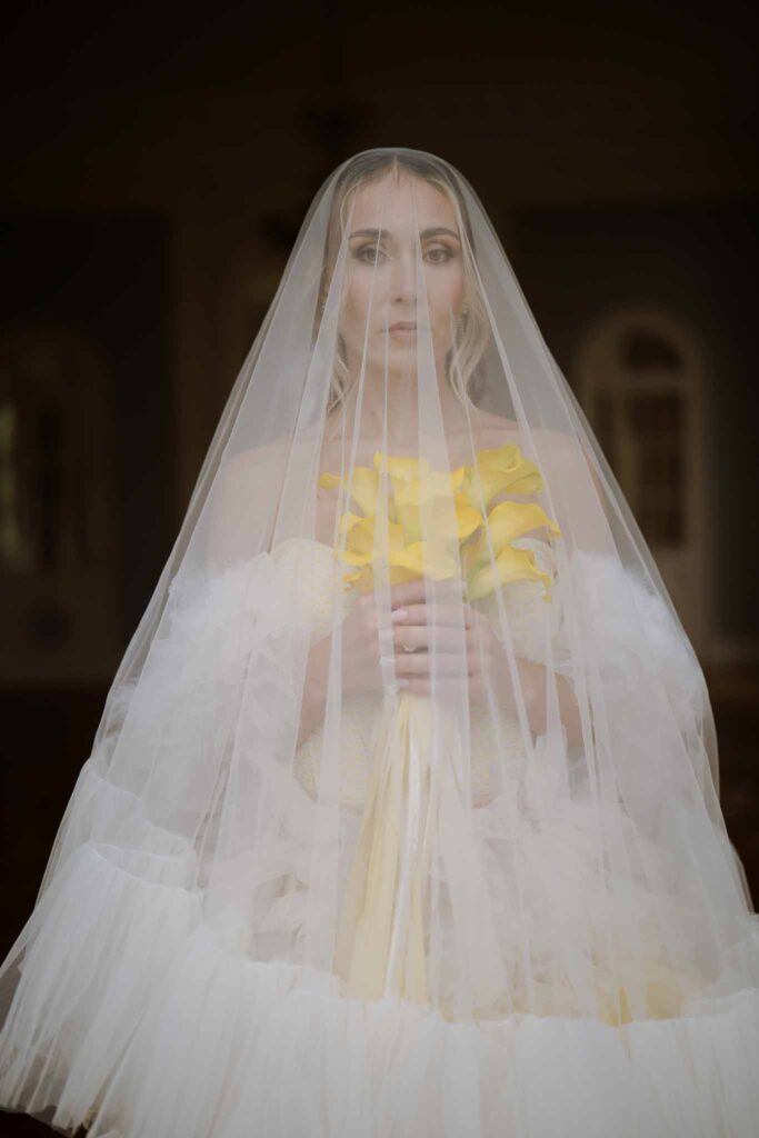 Prunay Theatre of Real Life n.reznik bride short tulle veil holding yellow flower bouquet