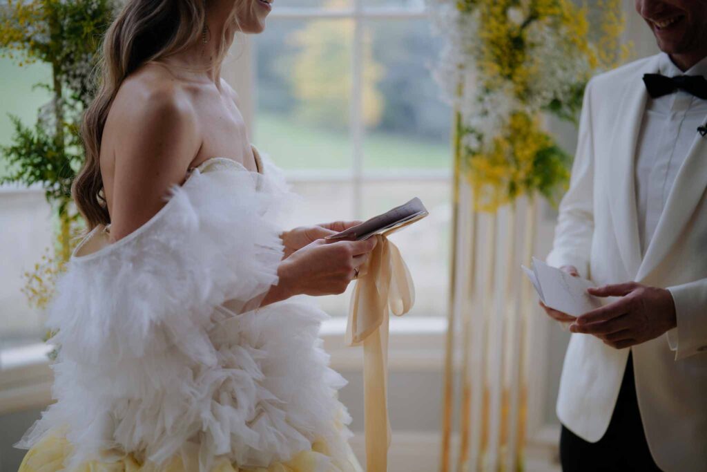 Prunay Theatre of Real Life n.reznik detail shot bride groom holding vow card ceremony