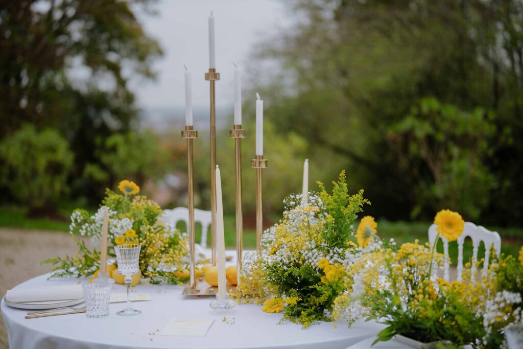 Prunay Theatre of Real Life n.reznik detail shot reception table lemons yellow flower gold candle holder